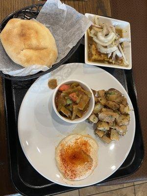 Curry Chicken, green beans, backed potatoes, Hummus Dip, pita bread, backed broccoli