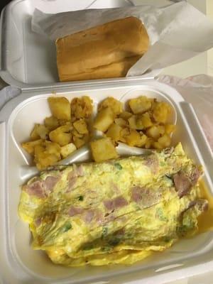 Spanish omelette, home fries & buttered bread