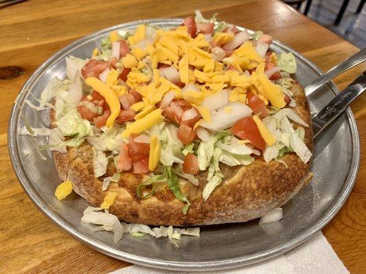 Eight inch hand tossed taco pizza.  Very good and fresh.