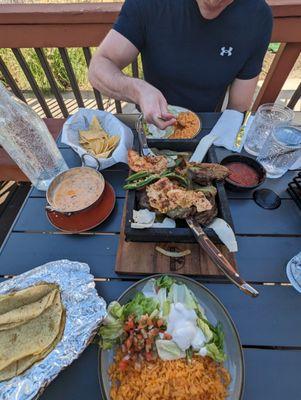 Molcajete, Chorizo con queso, chips and salsa.