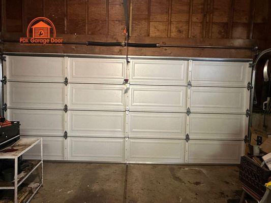 Non-insulated garage door spring replacement