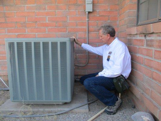 Visual inspection of an AC condensing coil.