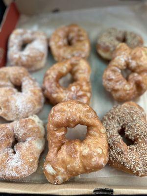 Cinnamon-Sugar, Vanilla Glazed, Bourbon-Sorghum and Sesame-Almond donuts