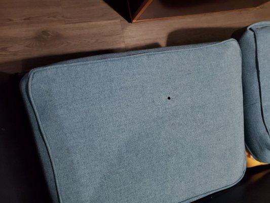 The couch pillow cover with a hole