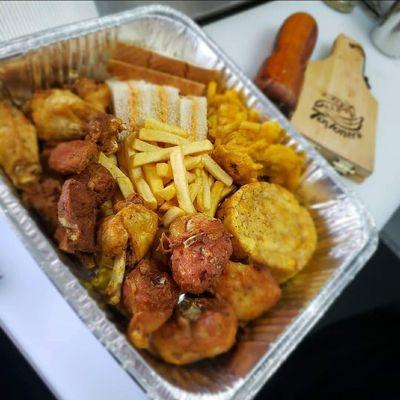 Bandeja Esmayá / Hungry Platter: Fried chicken, chicken wings, fried pork, fries, mofongo, tostones, SPAM finger sandwiches