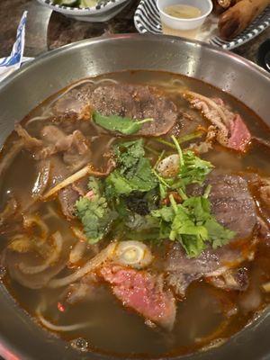 Spicy beef 12. Bun Bo Hue (Spicy Beef Noodle Soup)