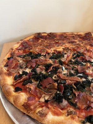 Large half pepperoni, sausage & bacon, other half that  plus spinach & mushrooms.