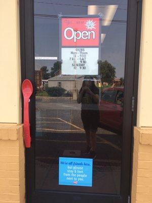 Hours sign & look at the cute red spoon door handle