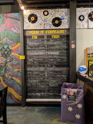 Pay it forward board at Monkey Wrench Brewing and Distillery, Suwanee