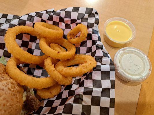 Onion rings with honey mustard and ranch dressing