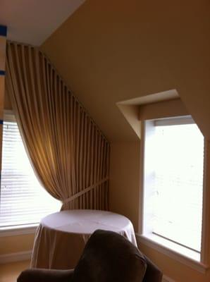 Very Custom Lined Pleated Drapery Panel to match pitch of gabled ceiling.