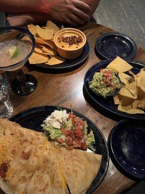 Cheese quesadilla, chips and guac, chips and queso