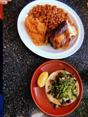 Rotisserie chicken, rice, beans and a carne asada taco