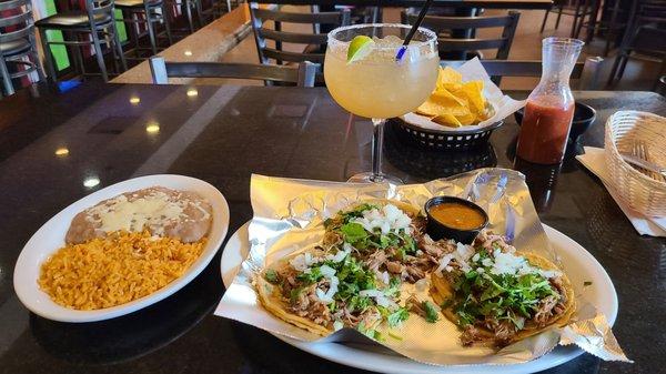 Tacos with side of rice and beans