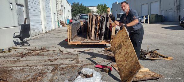 James is removing some miscellaneous wood debris for a commercial client