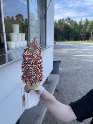 Medium swirl cone with rainbow sprinkles