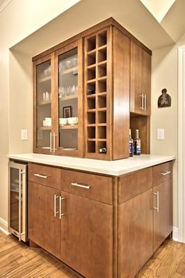 Bar area just outside of kitchen has Flat Panel doors, which is a more Modern look, as opposed to the Shaker style doors used in