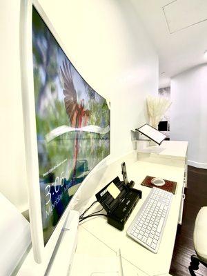 Reception desk at R Dental Group - Sleek, minimal, calm.