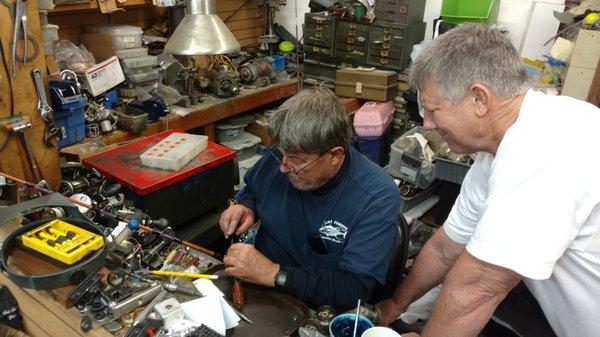 "See that little part there... " His custom tools get those little bits to do what they should do in no time at all. Note the box of parts!