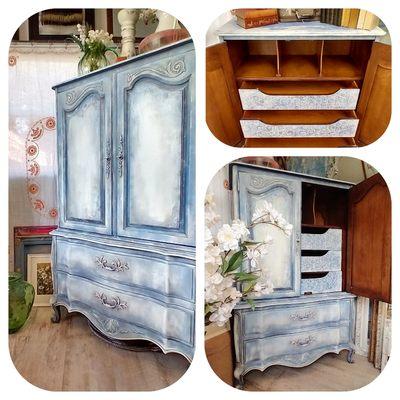 This french provincial style armoire was hand painted using clay based paint. Hand painted furniture is done by  owner of Saw Blossom.