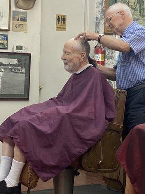 Dad getting his hair trimmed