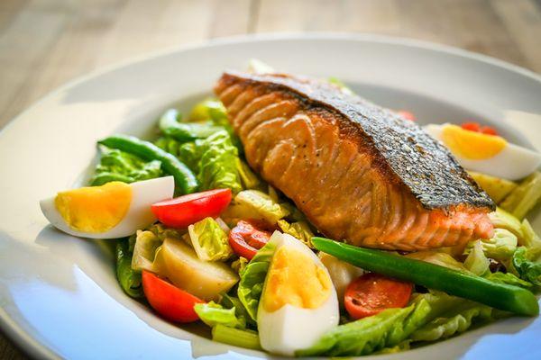 Seared Salmon Nicoise with Gems, Black Olives, Tomato and Farm Egg