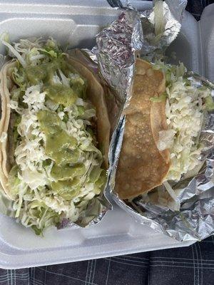 The green sauce on top is avocado. Ground beef tacos. One hard shell. One soft. Excellent!