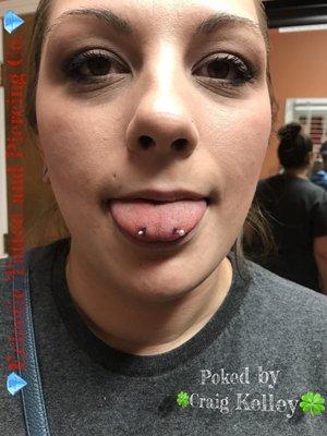 Snake eyes piercing done by Craig Kelley (poked)