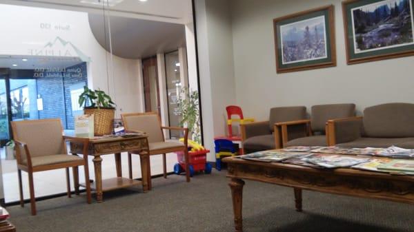 Waiting room looking into the lobby of the building