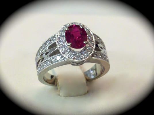 14 karat white gold Ruby and diamond ring custom designed and only available at H Tim Williams Jewelers