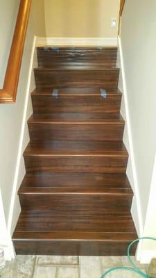 Laminate flooring installed on stairs with stairnose