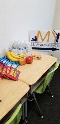 We provide snacks to the kids to recharge from a full day at school.