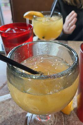 Peach margarita in front and Peach daiquiri in the background. Both were delicious