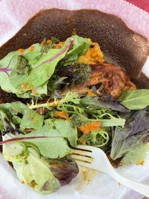 chicken leg combo with lentils, greens. topped with salad mix and both sauces. delish!!!