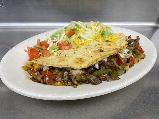 Steak Quesadilla add peppers and onions