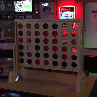 Connect Four!  Check out that giant juke box behind the Connect 4 board.