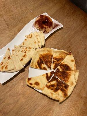 Hummus on the left  Tandoori Naan Bread on the right