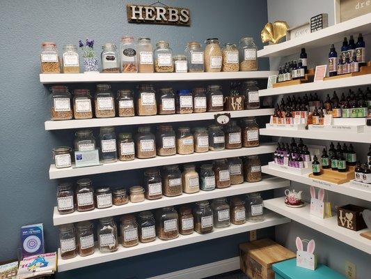 Shea's Apothecary's wall of herbs