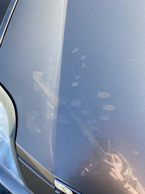 Condition my car was in when I went to pick it up... Dirty hand marks all over the hood.