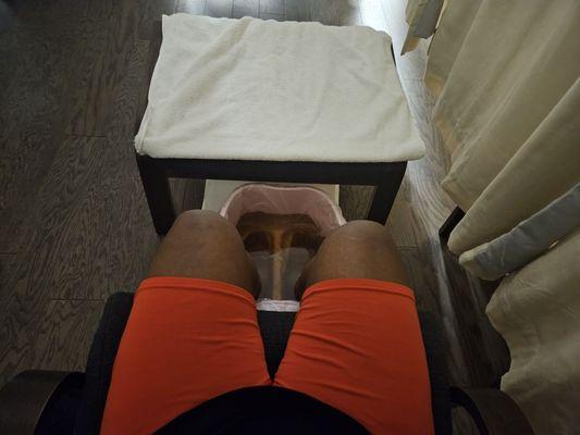 2//2/24  Looks like I am about to get a leg and foot massage. Today I wear black and orange..