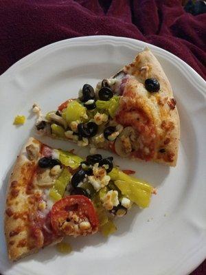 Garden Veggie pizza with no onions, plus Banana Peppers and Salami. They loaded this thing with toppings and it was amazing.