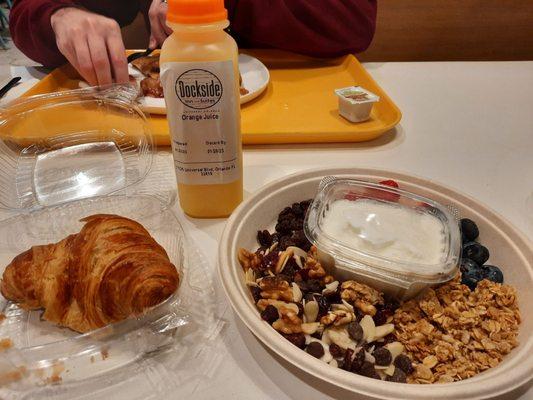 Fresh squeezed orange juice, very good croissant, yogurt parfait.