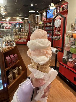 Peach and coconut gelato on waffle cone