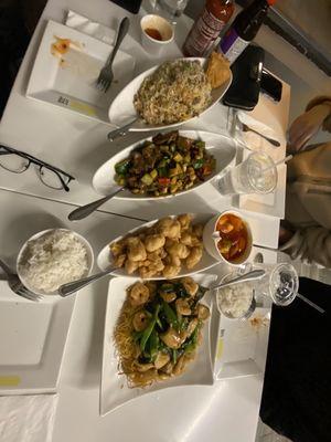 Left to right: beef fried rice (with a left over 001. Crab Rangoon), spicy beef stir fry, sweat and sour chicken, and pan fried noodles.