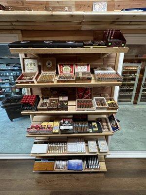 A selection of premium cigars brands including Luciano, Villiger, Cohiba, and Crowned Heads.