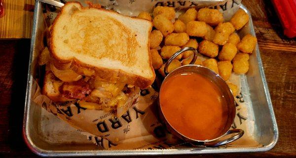 "Pierogis, an at" grilled cheese, tomato soup, and tots.