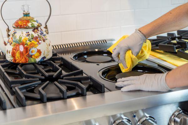 We gently remove stove burners and put back gently. We only use a non-abrasive blue sponge to clean.