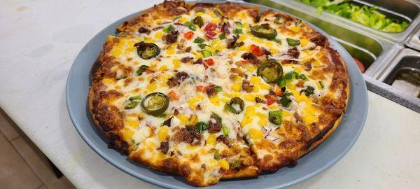 Pizza!! Make your own pizza with three toppings for just $9!