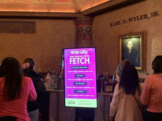 Guests lined up to purchase speciality cocktail drinks   in celebration of "Mean Girls    " the musical  !