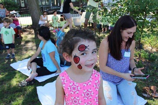 2016 Aug picnic. Showing off her face painting